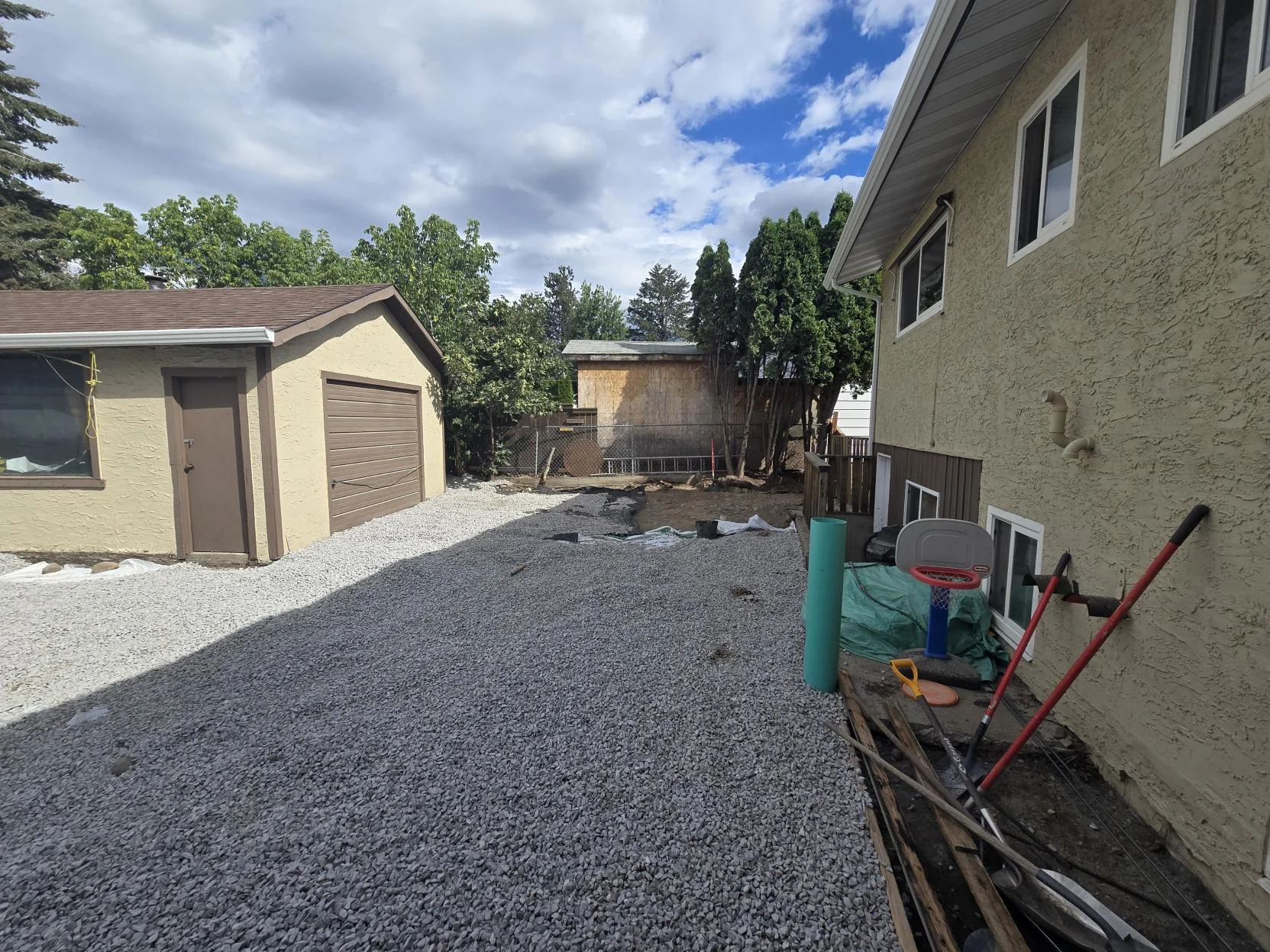 TNT Kelowna preparing a residential side yard for gravel installation