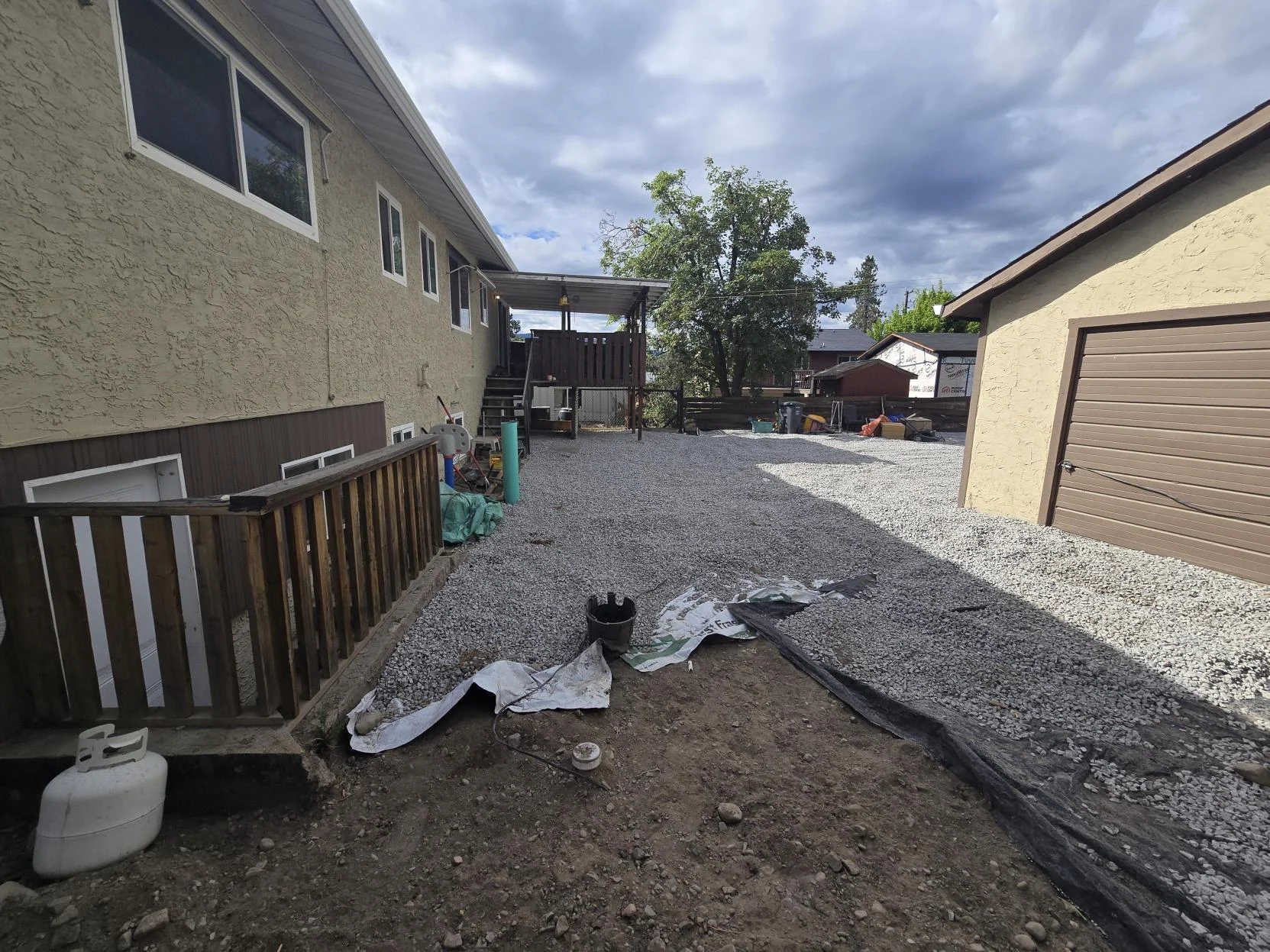 TNT Kelowna preparing a residential side yard for gravel installation